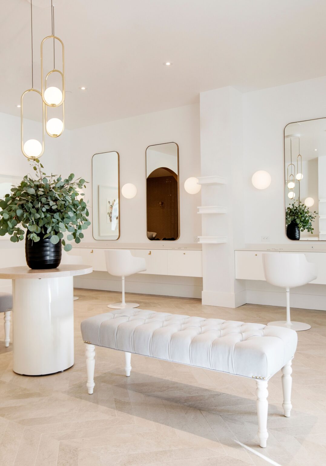 Wish Dry Bar salon interior with elegant styling stations and gold accents